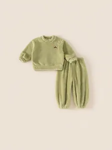 Thick green fleece pajamas set for kids featuring soft bear embroidery and ribbed cuffs