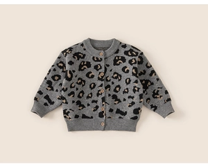 Detail of grey leopard print knitted cardigan with natural wooden buttons for kids
