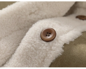 Detail of white sherpa fleece拼接 on green suede jacket with brown resin button