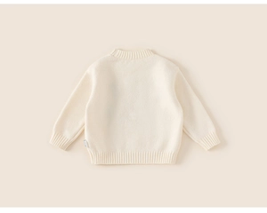 Detail of baby cream knit sweater back view with ribbed collar and soft texture