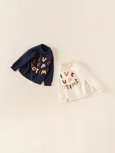 Kids warm knit sweater with colorful embroidery available in navy and cream white