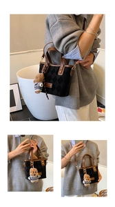 Three-way view of a black quilted bucket bag with leather trim and bear charm