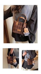 Close-up of brown quilted bucket bag with adjustable strap and cute bear plush charm