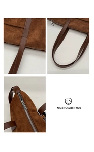 Detailed view of the brown frosted suede tote bag with reinforced stitching and zipper closure