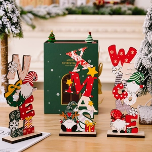 Three Christmas wooden desk ornaments featuring NOEL XMAS WELCOME designs and santa motifs