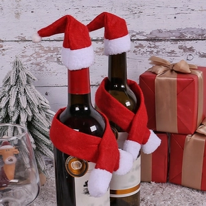 Christmas wine bottle cover set with mini Santa hats and red white scarves for holiday decor