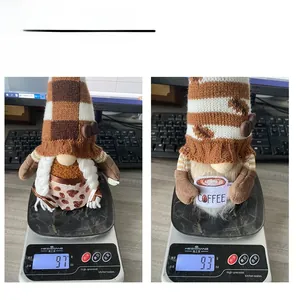 Detail of coffee gnome plush holding a coffee cup and weight measurements for decor
