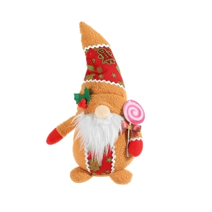 Christmas plush gnome with gingerbread hat and lollipop on white background