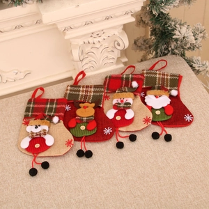 Set of 4 Christmas stockings with reindeer snowman Santa and polar bear patterns
