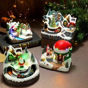 Escena de pueblo navideño musical giratorio con luces LED y tren en miniatura festivo