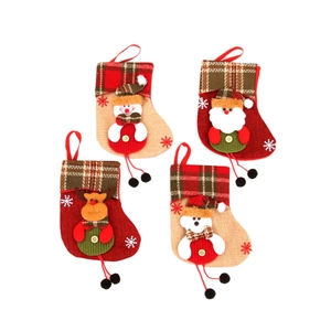 Set of 4 Christmas stockings with snowman Santa Claus reindeer and polar bear designs