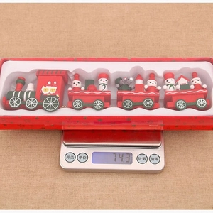 Festive 4-section wooden Christmas train set in a decorative red snowflake gift box