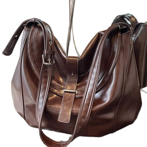 Retro coffee brown high-gloss leather hobo bag with adjustable wide silver buckle strap