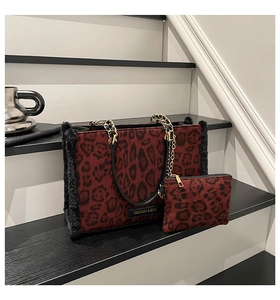 Detailed set of leopard print tote bag and matching small pouch with faux fur trim