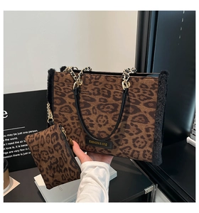 Detail of leopard print tote bag with faux fur trim, chain strap and matching coin purse