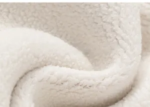 Λεπτομέρεια macro από μαλακή λευκή επένδυση fleece για ζεστό παιδικό παντελόνι