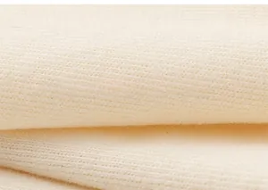 Close-up of soft ribbed knit cotton fabric texture for long sleeve girl's t-shirt
