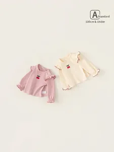 Girls long sleeve cotton t-shirt with cherry embroidery and ruffle trim details