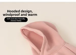 Detail of pink hooded sweatshirt showing soft fabric texture and windproof hood design