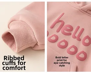 Detail of ribbed cuffs and 3D letter printing on light pink fleece hoodie top