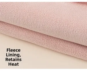 Detail of pink hoodie with soft fleece lining showing warm textured fabric material