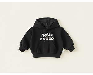 Detail of black children's hoodie featuring white hello ooooo print and kangaroo pocket