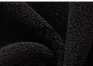 Detailed macro view of soft black fleece lining for warm children's cargo pants