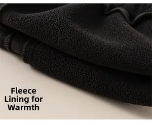 Detail shot of the warm black fleece lining on boys' heavy winter cargo trousers