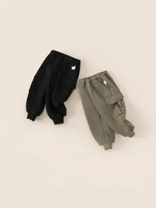Boys fleece lined cargo sweatpants in black and olive green with elastic cuffs