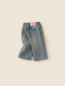 Pantalon en jean bleu clair pour fille avec taille élastique et poches arrière