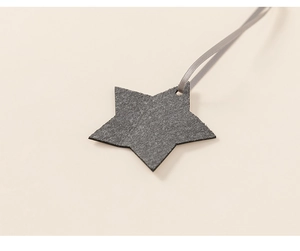 Close-up of a dark grey star-shaped felt pendant ornament with a matching ribbon hanger
