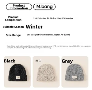 Detailed material tag for winter knit hat showing wool blend fabric and size information
