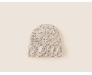 Detail showing the thick textured knit and mix-color weave of this warm winter beanie cap