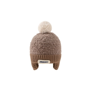 Warm kids knitted earflap beanie in brown patchwork with soft pompom and Journey patch