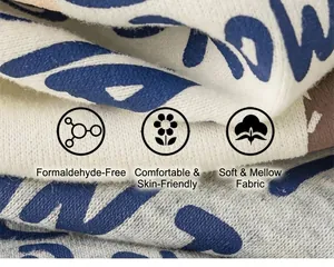 Close-up of soft children's hoodie fabric showing skin-friendly texture and safety icons