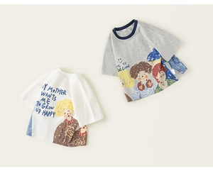 Detail of soft cotton kids t-shirts with cartoon prints and colorful hand-drawn illustrations