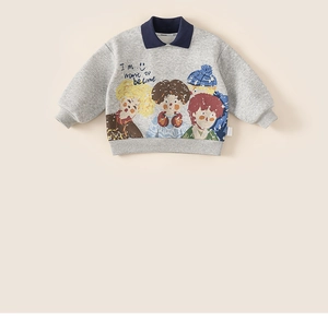 Close-up of boys gray fleece sweatshirt with navy polo collar and cartoon print