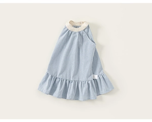 Detail of blue and white checkered summer dress featuring halter neck and ruffle hem