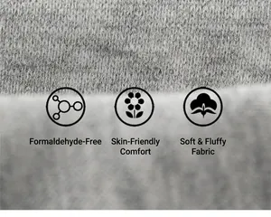Close-up of soft greyish-white knitted fabric with thick warm brushed fleece lining texture