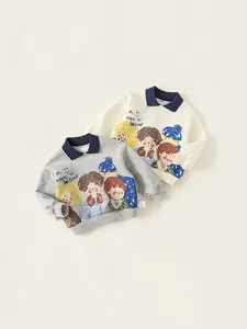 Kids long sleeve polo sweatshirt with cartoon illustration print in gray and beige colors