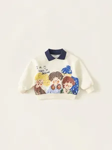 Kids polo collar sweatshirt with cartoon print and ribbed cuffs in beige and navy blue