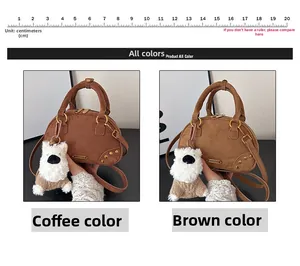 Detail view of vintage suede bowling bags in brown and coffee with plush dog charms