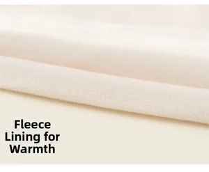 Detailed macro view of soft off-white fleece lining providing thermal warmth and insulation