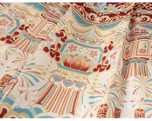 Detailed close-up of Chinese New Year motifs on premium red horse-face skirt fabric
