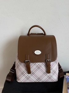 Vintage British school backpack in brown leather and pink plaid with rabbit badge