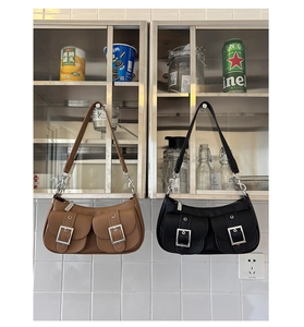 Retro underarm bags in brown and black leather with vintage dual metal buckle pockets