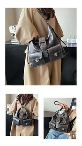Detail of vintage faux leather tote bag showing magnetic buckle pockets and versatile straps