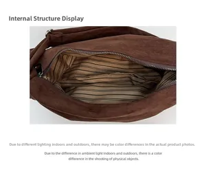 Detail shot of leopard print bag interior showing striped lining and a zipper pocket