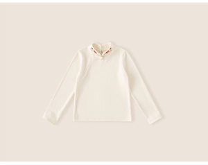 Detail of Chinese style embroidery on the collar of this warm white down jacket for girls