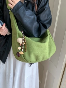 Retro moss green suede oversized crossbody bag with decorative beaded charm for women
